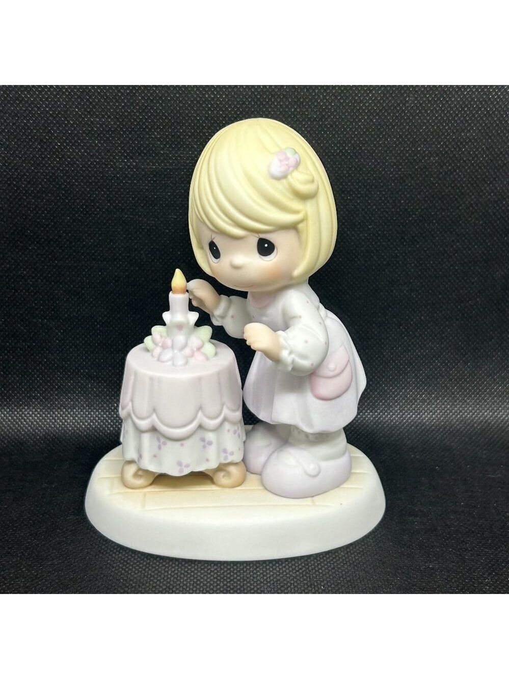 Precious Moments "A Mother's Love Is A Warm Glow" figurine
